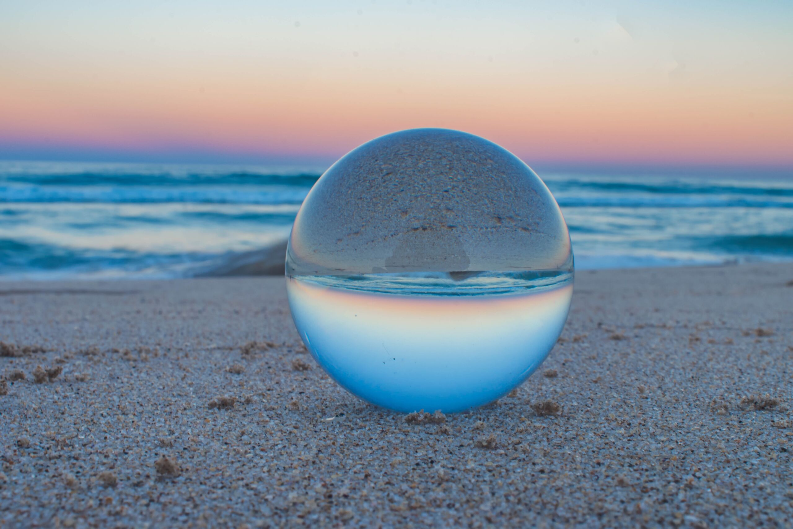 Small group leadership workshop or facilitated discussion in a modern, light-filled workspace.